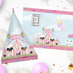 May include: A party-themed set featuring a cone-shaped party hat and a treat bag. Both items display a circus scene with cartoon girls, a circus tent, and the words "Happy Birthday." The background is light blue with pink accents.