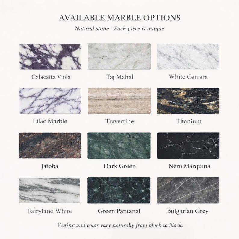 Puede incluir: Una cuadr&iacute;cula de doce muestras rectangulares de m&aacute;rmol titulada Available Marble Options. Las piedras incluyen Calacatta Viola, Taj Mahal, White Carrara, Lilac Marble, Travertine, Titanium, Jatoba, Dark Green, Nero Marquina, Fairyland White, Green Pantanal y Bulgarian Grey.