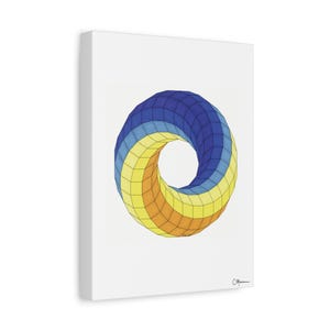 May include: A canvas print featuring a geometric, three-dimensional torus design. The artwork showcases a gradient of colors, transitioning from blue to yellow and orange. The piece is mounted on a white canvas.