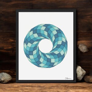 May include: Framed art print featuring a geometric design. The artwork showcases a torus shape composed of blue and teal squares, creating a 3D effect. The print is set against a white background and framed in black.