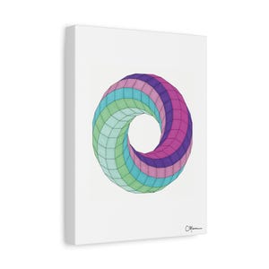 May include: A canvas print featuring a geometric, three-dimensional torus shape. The artwork showcases a vibrant color palette, with sections of green, blue, and purple. The design is set against a white background, creating a striking visual contrast.