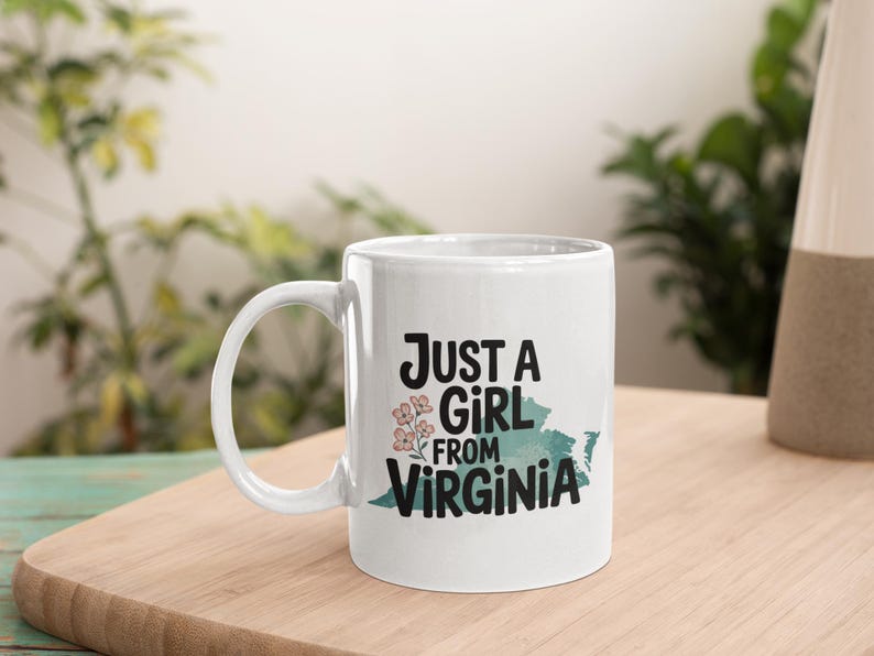 a coffee mug that says "Just a girl from virginia"