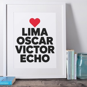 a photo in a frame that says Lima Oscar Victor Echo with a heart above it