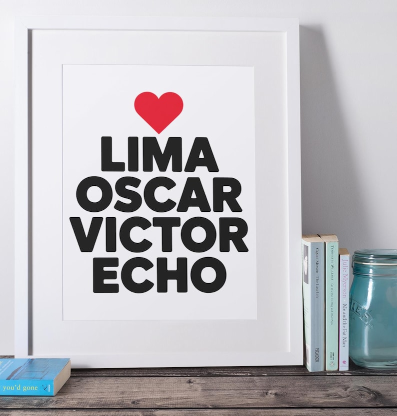 a photo in a frame that says Lima Oscar Victor Echo with a heart above it