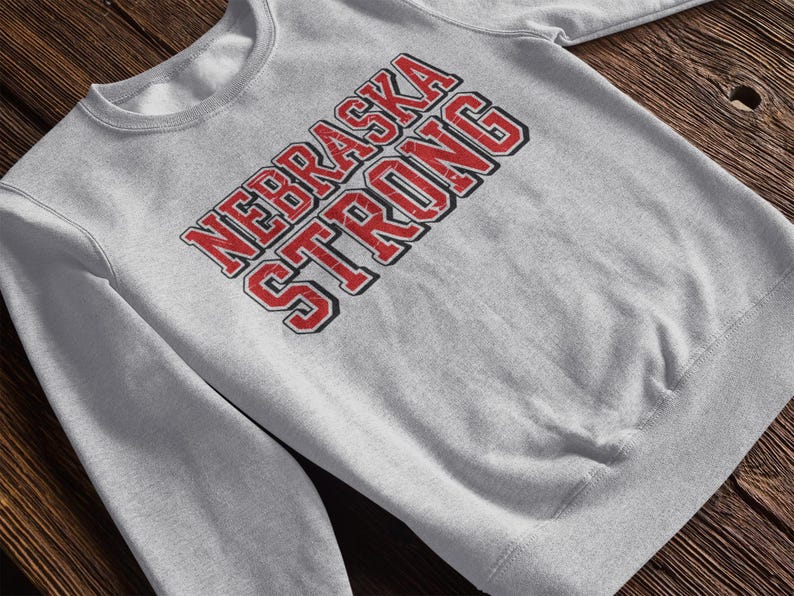 A grey sweatshirt that says "Nebraska Strong"