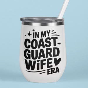 A tumbler that says In my coast guard wife era with a light blue background
