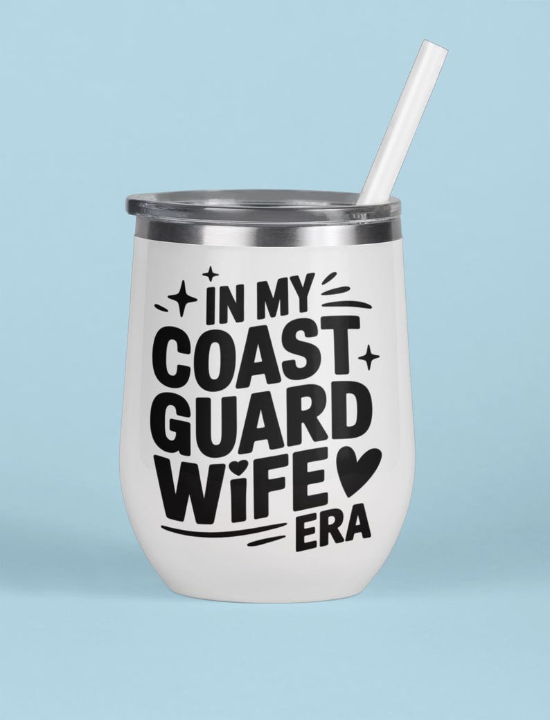 A tumbler that says In my coast guard wife era with a light blue background