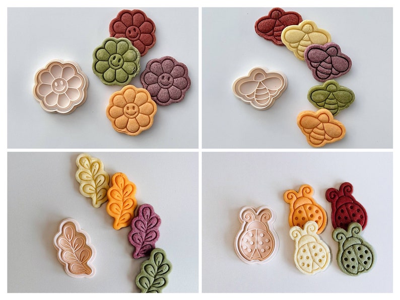 May include: Assortment of cookie cutters in various shapes, including flowers, bees, and ladybugs. The cutters are made of a white plastic material and are arranged on a white background.