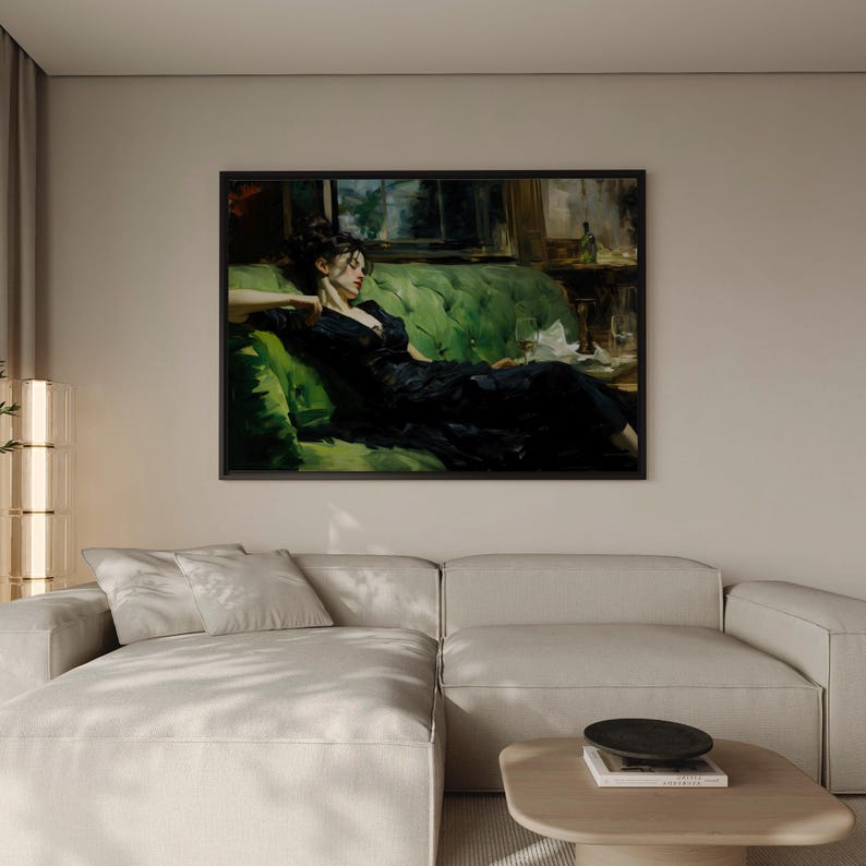 a large painting of a woman in a black dress sitting on a green couch, with a book and a glass of wine on the couch.