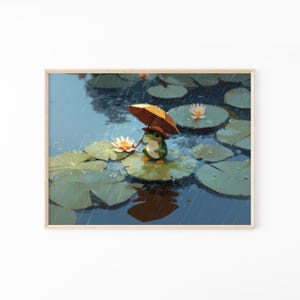 以下が含まれることがあります： 雨の中で池のハスの葉の上に立つ緑色のカエルを描いた額入りアートプリント。カエルは小さなオレンジ色の傘をさしている。暗い青色の水面には、他のハスの葉や白いスイレンの花がいくつか浮かんでいる様子が描かれている。