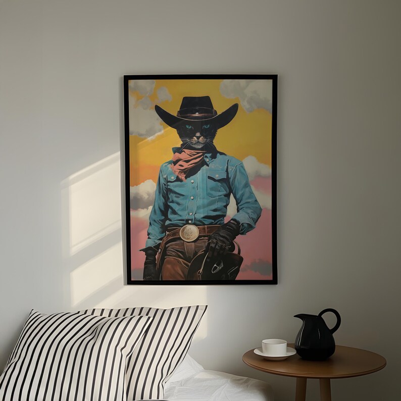 a framed poster of a cat dressed as a cowboy, wearing a blue shirt, brown pants, and a cowboy hat, standing against a colorful background.