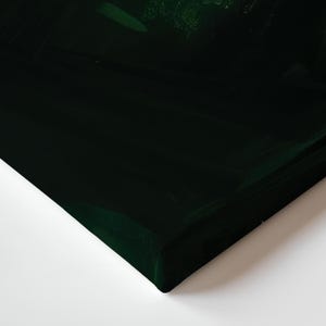 The image is a dark green color, possibly a shade of green, and it appears to be a close-up view of a surface or object.