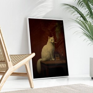 A framed painting of a white cat sitting on a table, with a glass of wine and a plant in the background.