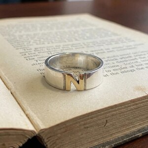 Single letter initial handmade ring carving