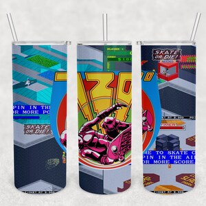 May include: A set of three 20 oz stainless steel tumblers with a retro video game design. The tumblers feature a blue, yellow, and red color scheme with pixelated graphics and text that reads "Skate or Die!" and "Pin in the Air for More Score".