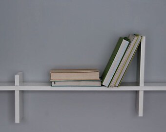 NEW! Launch your Space! Craft a chic wood modern wall shelf with our easy DIY plans. Start building today for a stylish space!