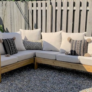 Elevate your outdoors! Craft a chic wood patio sectional with our easy DIY plans. Start building today for a stylish space!