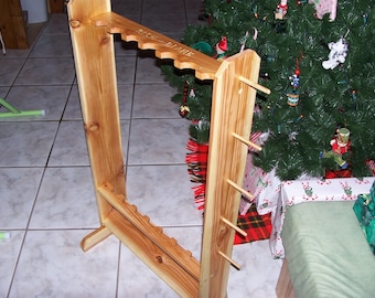 Reel in Success! DIY Fishing Rod Rack Plans - Showcase your gear and boost woodworking skills. Dive into your fishing haven today!