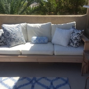 Boost your Space! Craft a chic wood patio sofa with our easy DIY plans. Start building today for a stylish space!