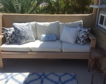 Boost your Space! Craft a chic wood patio sofa with our easy DIY plans. Start building today for a stylish space!