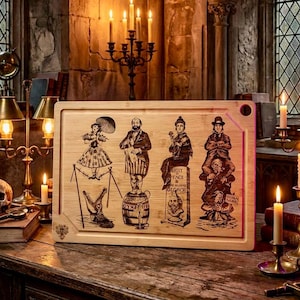May include: A rectangular bamboo cutting board with a decorative engraving of vintage circus performers. The artwork includes a woman with an umbrella, a man on a barrel, and other figures. The board is set on a wooden table with candles and a skull.