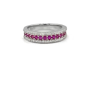 May include: A silver band ring with a row of pink gemstones and a row of clear gemstones.