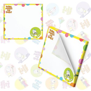 May include: A yellow notepad with a colorful border and a cartoon girl on the cover. The notepad has the text "Flora Makes Me Smile" on the cover. The notepad is on a white background with a pattern of colorful circles with the text "Flora Makes Me Smile" on them.
