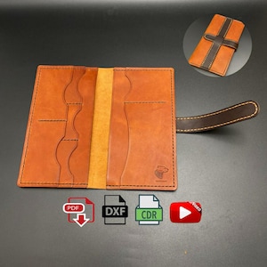 May include: Open, handmade leather wallet in shades of brown, with a contrasting dark brown strap and stitching. The wallet has multiple card slots and a central pocket. A smaller, closed version of the wallet is shown in the upper right corner.