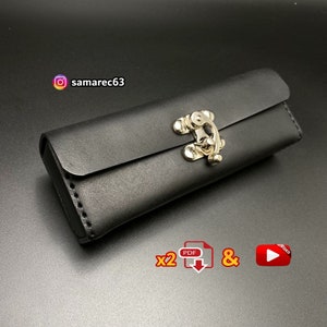 May include: A black leather case with a silver clasp. The rectangular case has a flap closure and is stitched along the edges. The Instagram handle "samarec63" is visible in the upper left corner. The image also includes PDF and YouTube icons.