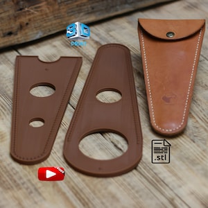 Könnte beinhalten: Braune 3D-gedruckte Teile mit genähten Kanten und einer Ledertasche. Die Teile haben kreisförmige Aussparungen. Das Bild enthält den Text "3D PRINT", ".stl" und eine Video-Play-Schaltfläche.