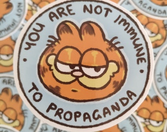 3 inch "You are not immune to propaganda" Garfield Sticker