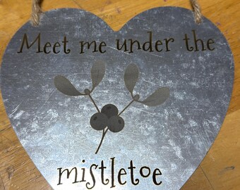 Letrero navideño metálico de pared "Nos vemos bajo el muérdago"