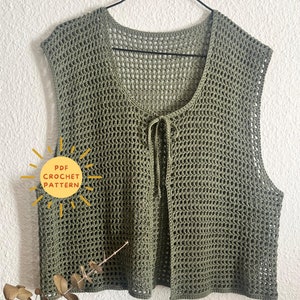 May include: A green crochet vest with a tie closure. The vest is made with a simple stitch pattern and has a relaxed fit. The image includes the text "PDF CROCHET PATTERN".
