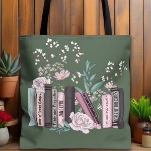 May include: A green tote bag with a floral design and a stack of books with titles including "Anne of Green Gables", "Pride and Prejudice", "Jane Eyre", "Far From the Madding Crowd", "Wuthering Heights", and "A Tale of Two Cities".