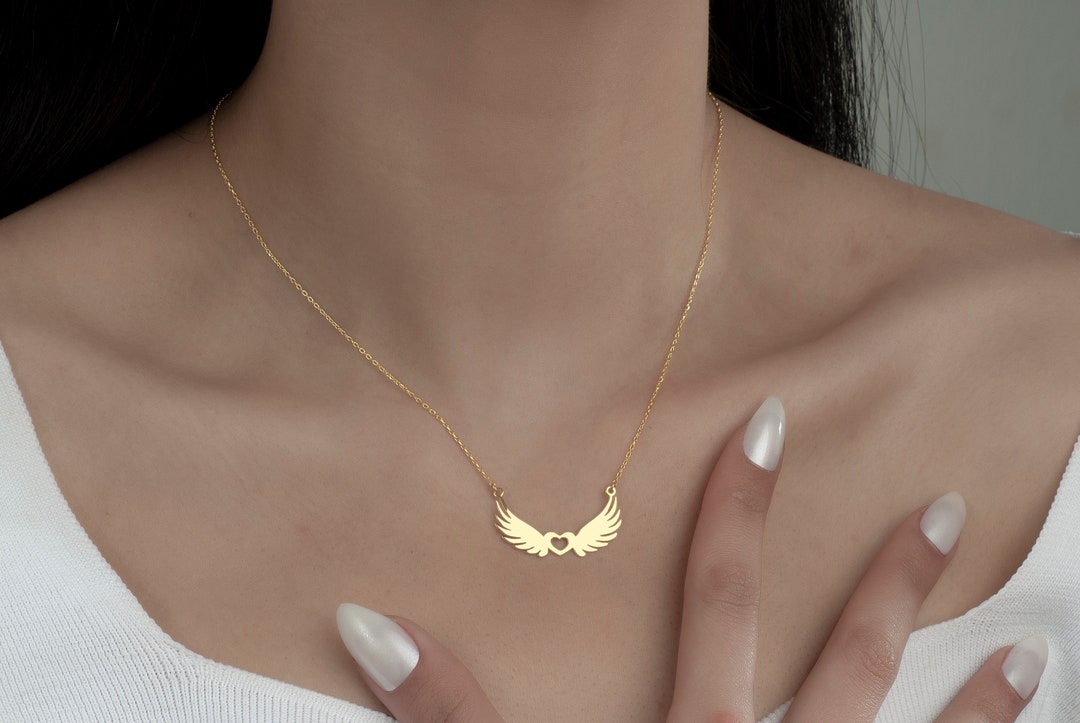 Golden angel wings necklace
