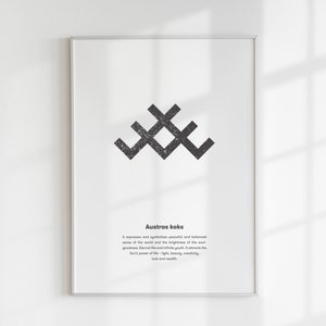 May include: A framed print with a black and white geometric symbol, called "Austras koks", which represents the peaceful and balanced sense of the world and the brightness of the soul. The text explains that the symbol embodies the power of life, light, beauty, creating, luck and wealth.