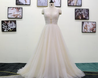Beaded Lace Wedding Dress: Tulle A-Line, Backless Bridal Gown