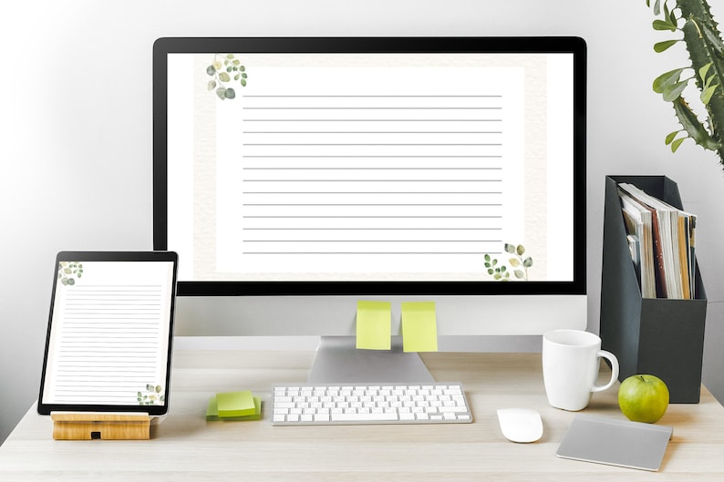 May include: A desktop setup featuring a computer monitor and a tablet displaying lined paper with watercolor eucalyptus accents. A white mug, green apple, and keyboard are also visible, suggesting a workspace or stationery theme.