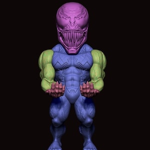 May include: A purple and green figurine of a superhero with a large head and a menacing expression. The figurine is standing on a green base with claws.