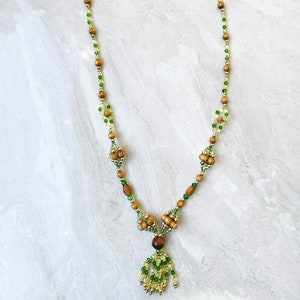 Orula Crystal Necklace with Green, yellow and wood Beads