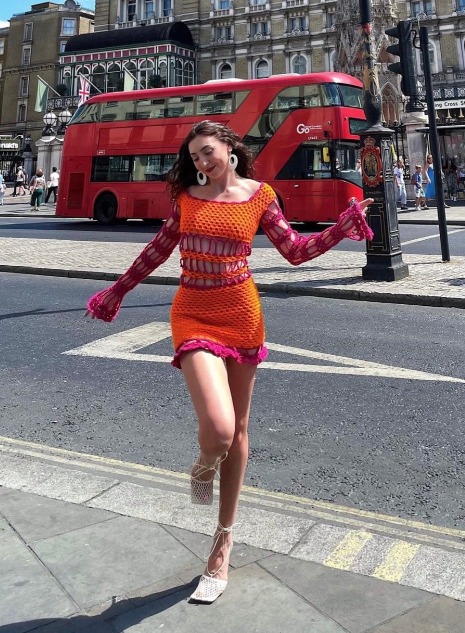 Here come the FemBots! Girls in stick-on bras take to the streets of London