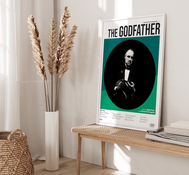 May include: A green and white movie poster for the film "The Godfather" featuring a black and white image of Marlon Brando as Don Vito Corleone. The poster includes the film's title, director, and cast.