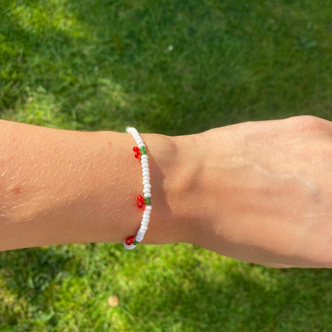 Handmade Cherry Seed Beaded Bracelet in White, Red and Green - Etsy UK