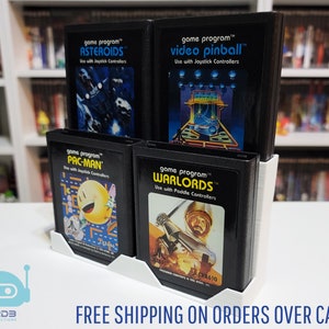 Atari 2600 / 7800 / Colecovision ゲーム用ディスプレイ (1 ～ 15 個のカートリッジ)