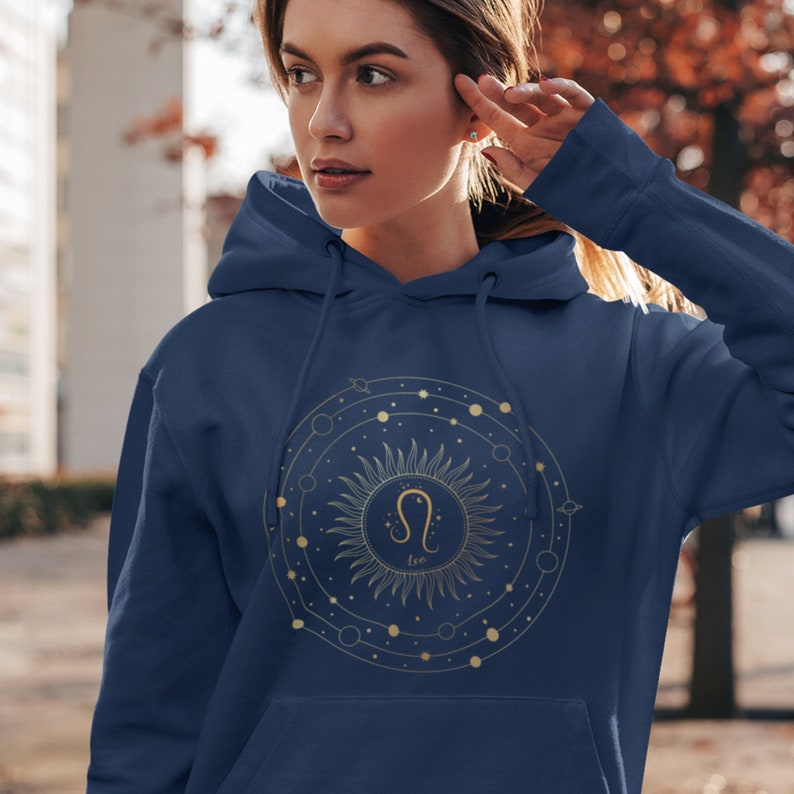 Hooded sweatshirt with Leo zodiac sign and sun and planet sublimination printed design