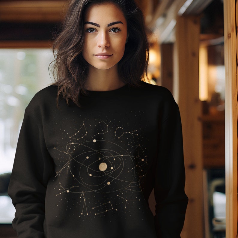 Galaxy and astrology sublimination printed custom design on a cozy sweatshirt