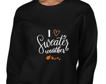 May include: Black sweatshirt with white text that says "I love sweater weather" with a small heart above the word "sweater". There are small orange leaf designs below the text.