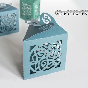 May include: A set of three blue and green paper boxes with intricate cut-out designs. The boxes are folded and ready to be assembled.  INSTANT DIGITAL DOWNLOAD SVG, PDF, DXF, PNG