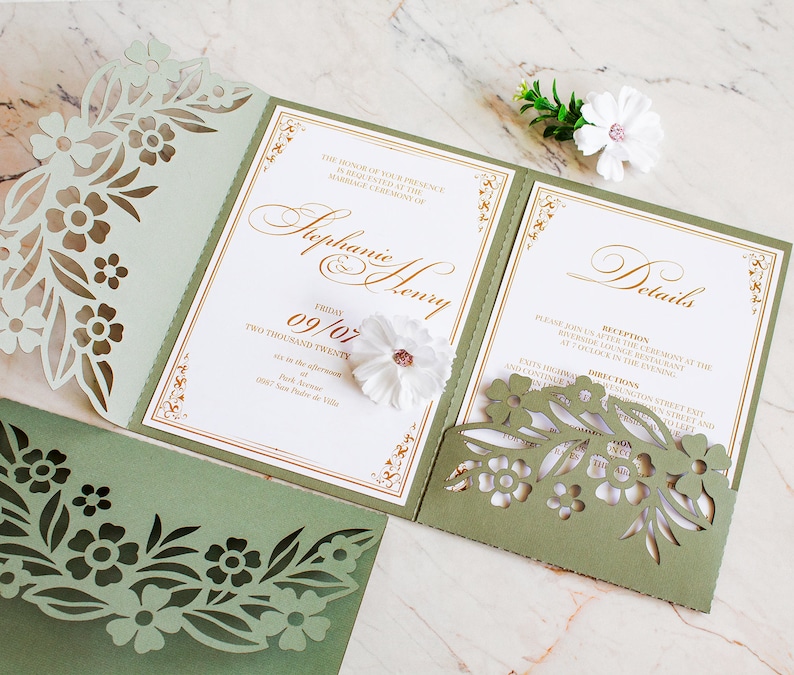 May include: A green and gold wedding invitation with a floral design. The invitation is for Stephanie and Henry, and the wedding is on Friday, September 7th, 2020. The invitation includes details about the reception and directions to the venue.