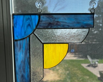 Stained glass corner window piece.